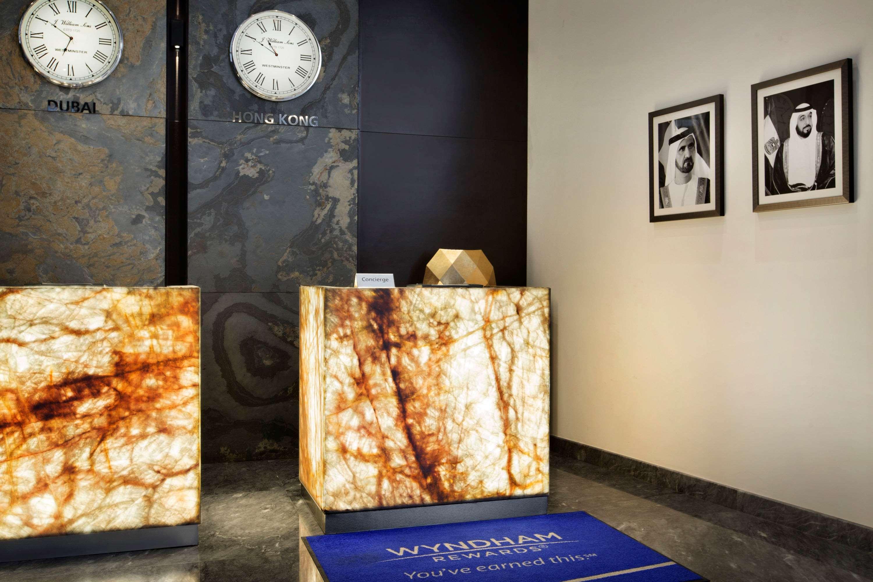 Hotel The First Collection Dubai Marina Esterno foto Reception desk with a marble finish