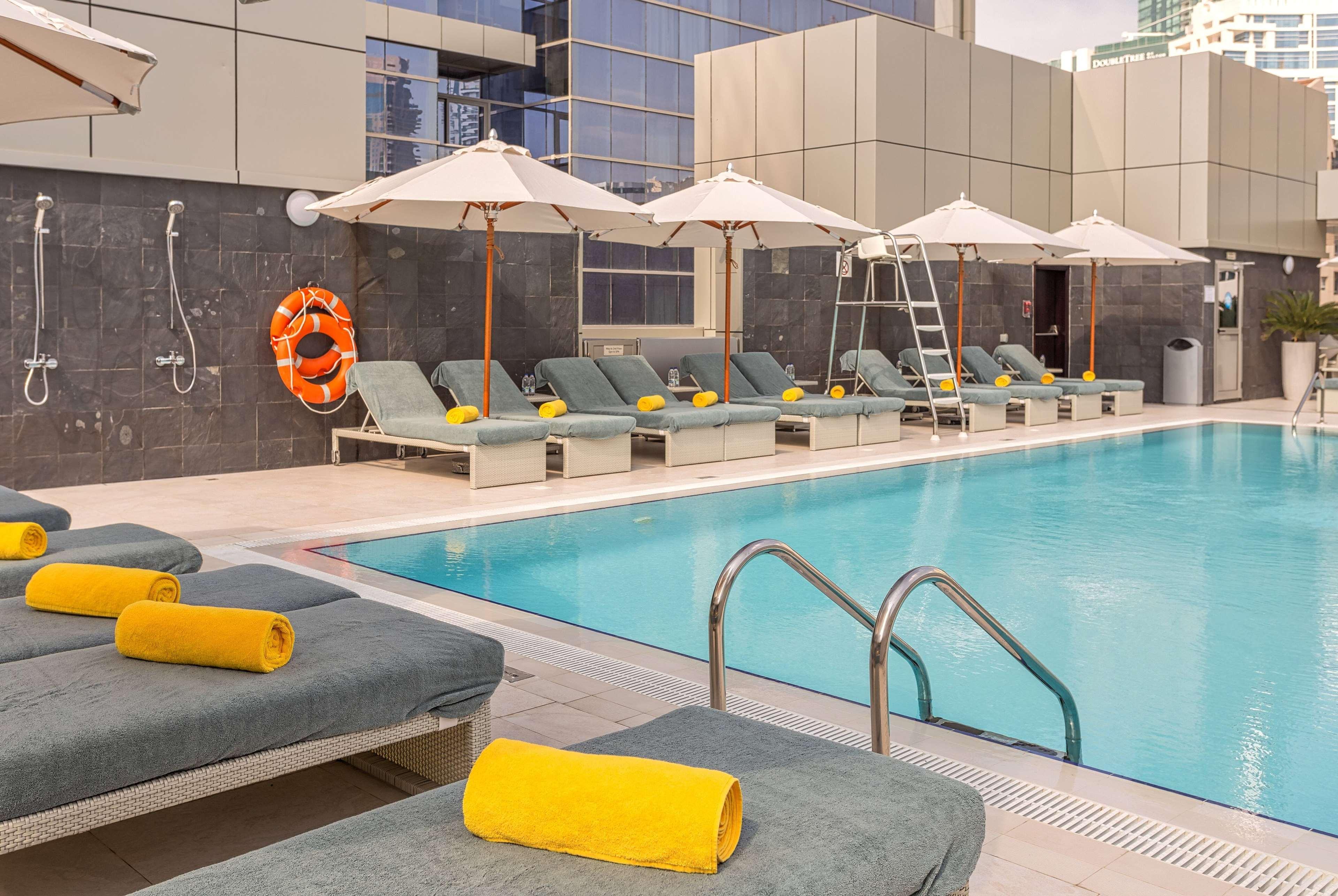 Hotel The First Collection Dubai Marina Esterno foto Swimming pool